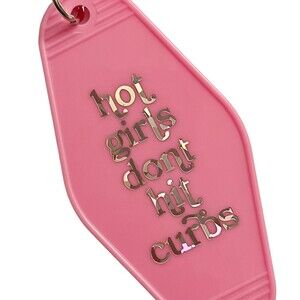 Pink Motel Room Keychain Holographic print says “hot girls don’t hit curbs”